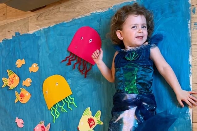 Nancy, aged three, recreated the ocean and became a mermaid
