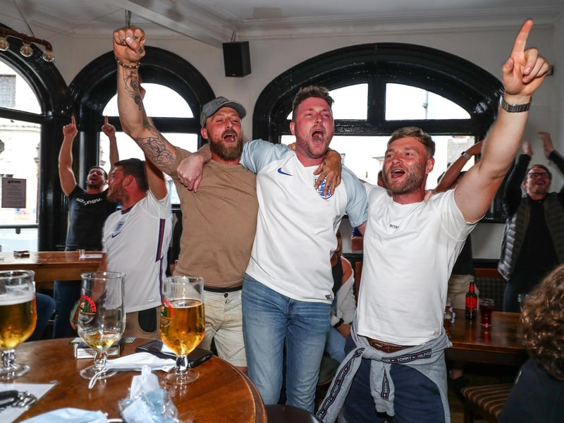 England fans watch England beat Germany 2-0 in the Euros 2020.Fans pictured in The Kings pub celebrating on the final whistle.Picture: Stuart Martin (220421-7042)