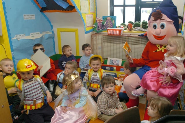 Noddy read a book to tots at the Small World Nursery's  national book day celebrations in 2005
