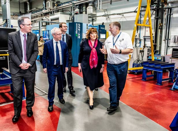 Keith Ridgway, right, on a tour of the AFRC facilities in Glasgow with, second left, Sir Martin Donnelly, President of Boeing Europe and Managing Director of Boeing UK and Fiona Hyslop MSP, Cabinet Secretary for Economy, Fair Work and Culture.