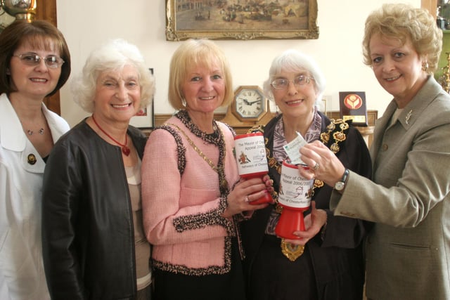 Members of Chesterfield  Operatic society, Diane Sanderson, Marlene Smith, and Sue Siddall present cheq for £2362 to Mayor Trudi Mulcaster  and Mayoress June Brown.