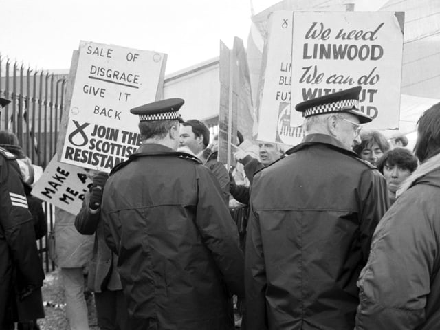 Police step in at Linwood Rootes car factory in November 1981 when demonstrators gather at the auction of fixtures and stock.