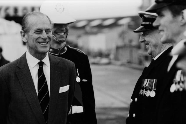 Mr Archie Weston of the Royal Naval Volunteer Band of HMS Collingwood shares a joke with Prince Philip the Duke of Edinburgh on the 3rd December 1993.