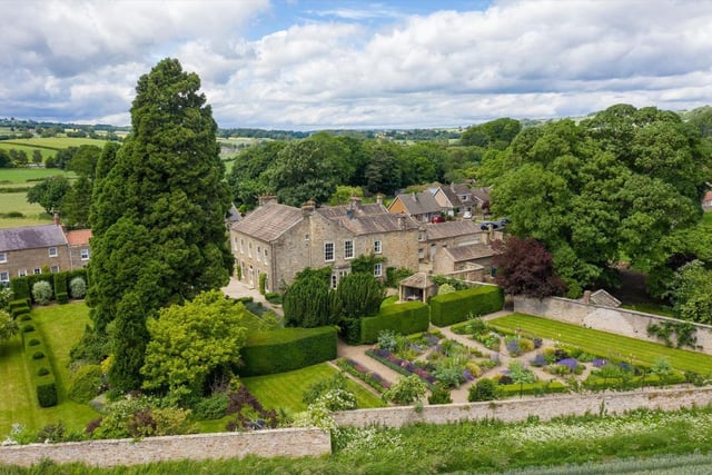 The six-bedroom Gilling Lodge, on High Street, Gilling West, near Richmond, North Yorkshire, is described by estate agent Knight Frank as a "beautiful Georgian country house", with its "classic Georgian façade facing the gardens making it particularly attractive".