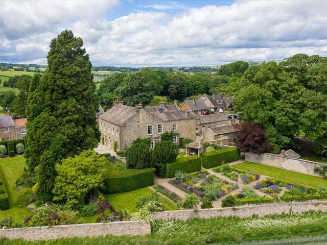 The six-bedroom Gilling Lodge, on High Street, Gilling West, near Richmond, North Yorkshire, is described by estate agent Knight Frank as a "beautiful Georgian country house", with its "classic Georgian façade facing the gardens making it particularly attractive".