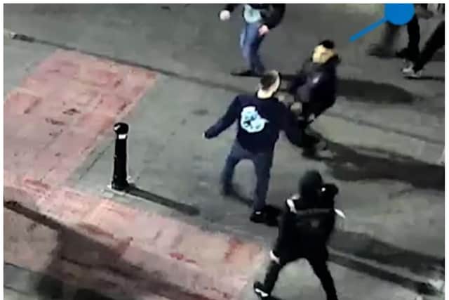 The shocking moment Amrit Jhagra (marked with blue pointer) stabbed Ryan Theobald in Doncaster before also going on to kill Janis Kozlovskis.