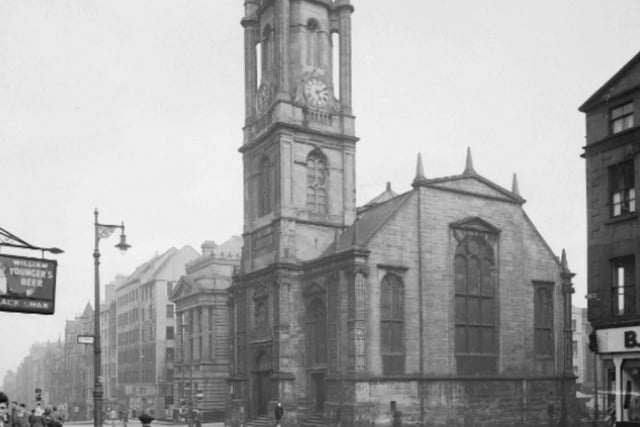 This picture of St Giles' Cathedral was taken in April 1950 and shows buildings that were later demolished, including the Black Swan pub.