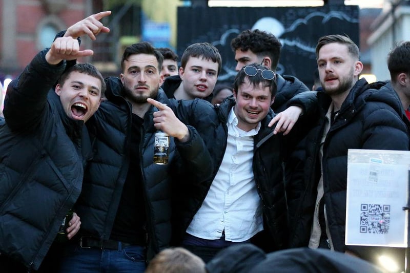 A group of friends react for the camera on the streets in Manchester's Northern Quarter on April 16, 2021 in Manchester, England. (Photo by Charlotte Tattersall/Getty Images)