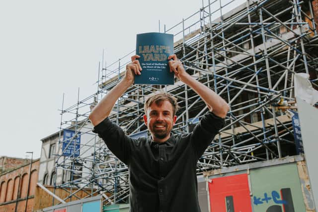 Matt Hill, co-founder, Union St, holding a copy of the plans outside Leah’s Yard, Sheffield.