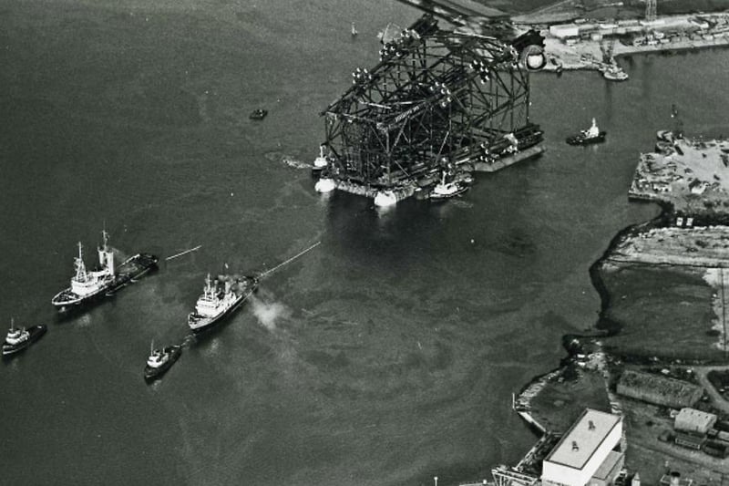 An aerial view of an oil rig leaving Laing Offshore at Graythorp, Hartlepool. Photo: Hartlepool Library Service.