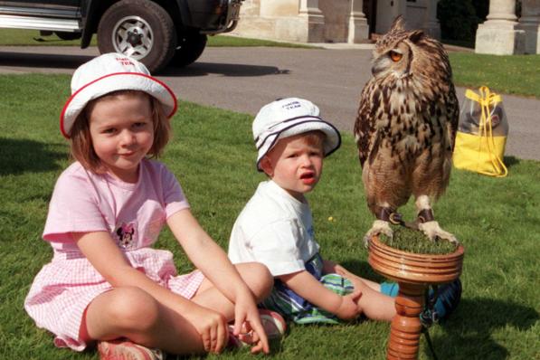 Scawsby children Tasmin and Nathaniel at Brodsworth Hall admiring a large owl, 1999.