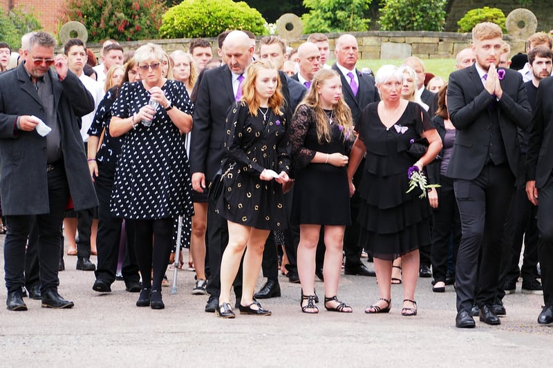 Family and friends of Gracie gather for the church service to honour her life.