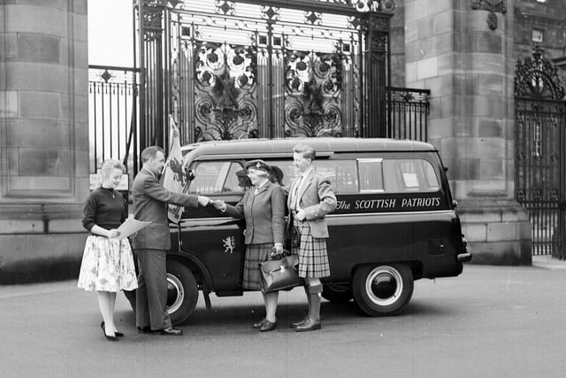 Miss Wendy Wood receives  the Scottish Patriots van from Mr Howard Puidit