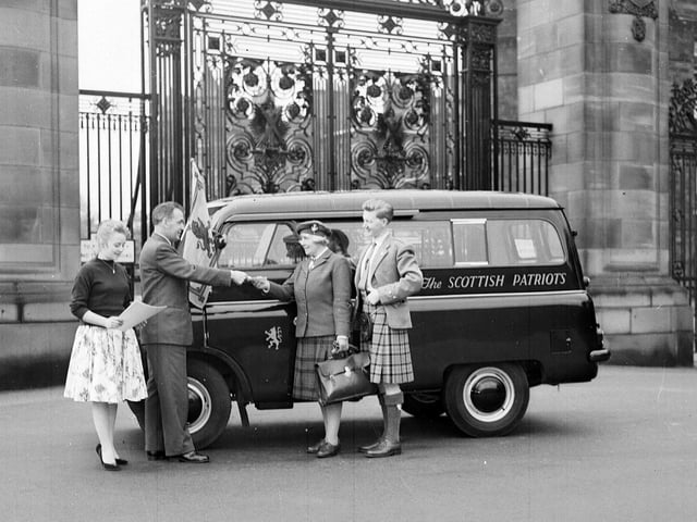 Miss Wendy Wood receives  the Scottish Patriots van from Mr Howard Puidit