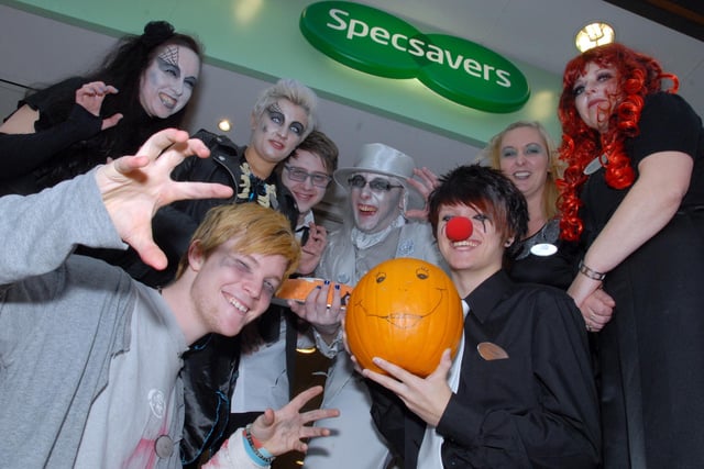 Staff at Specsavers celebrate Halloween and the centre's 40th anniversary in 2011.