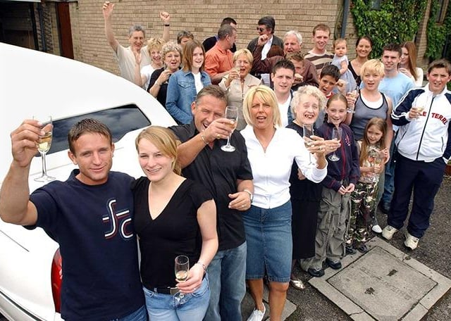 Back from Iraq is Sheffield solider Greg Shaw (left) of Mosborough, who met up with his girlfriend at a surprise party the family held for him at his Mosborough home, May 11, 2003