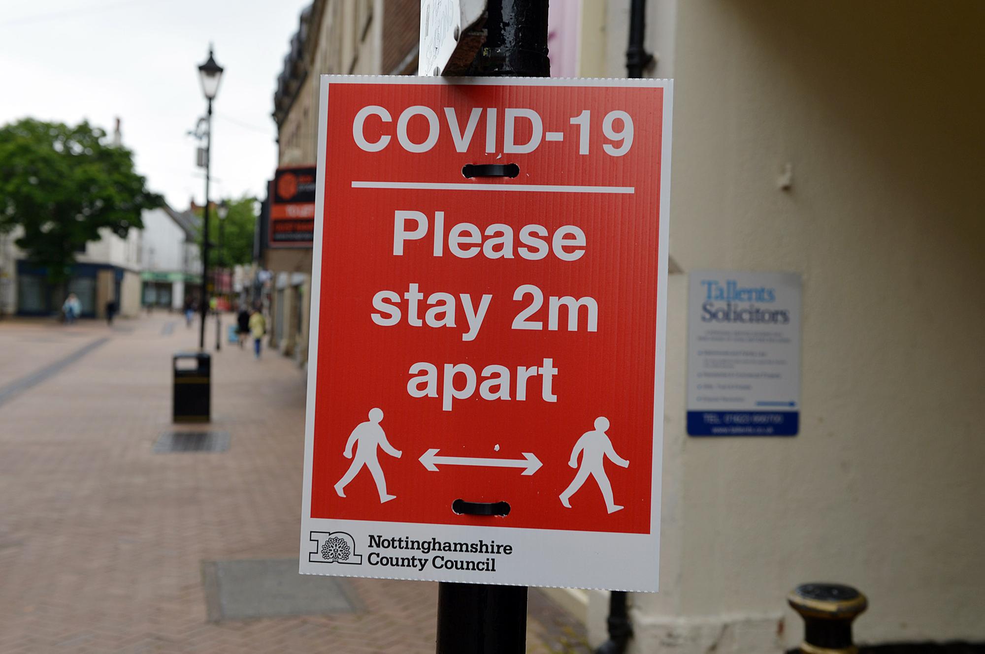 Mansfield Town centre 10 weeks into lockdown. Signs going up in preparation for more lockdown easing on Monday June 15th.