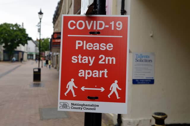 Mansfield Town centre 10 weeks into lockdown. Signs going up in preparation for more lockdown easing on Monday June 15th.
