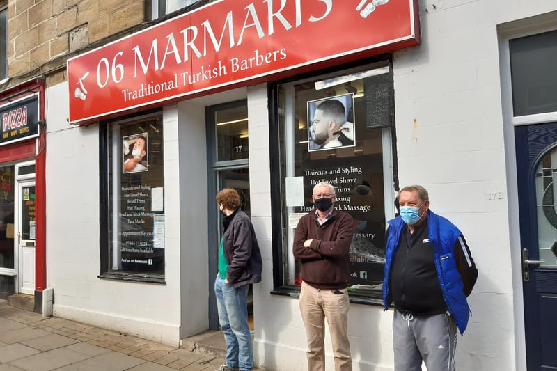Customers waiting patiently at Marmaris barber shop.