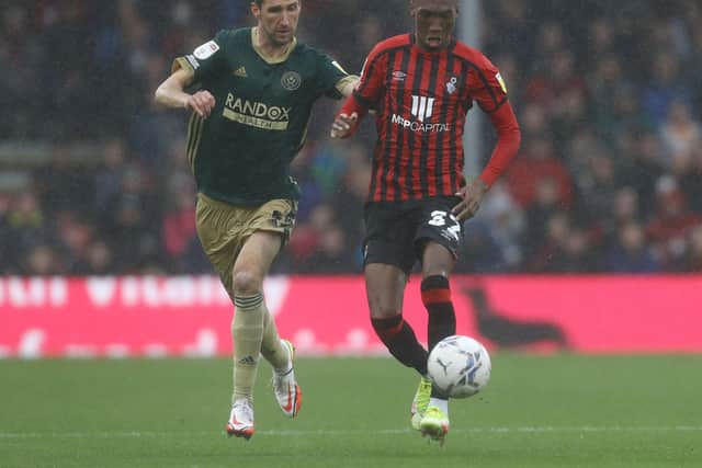 Bournemouth, England, 2nd October 2021. Chris Basham of Sheffield Utd tackles Jaidon Anthony of Bournemouth  during the Sky Bet Championship match at the Vitality Stadium, Bournemouth. Picture credit should read: Paul Terry / Sportimage