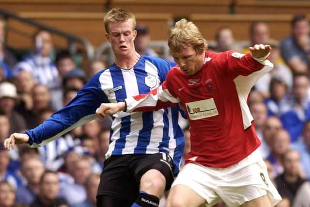 Sheffield Wednesday's Chris Brunt (L) and Hartlepool's Richie Humphreys in action during the Coca-Cola League One play-off final at the Millennium Stadium, Cardiff, Sunday May 29, 2005.