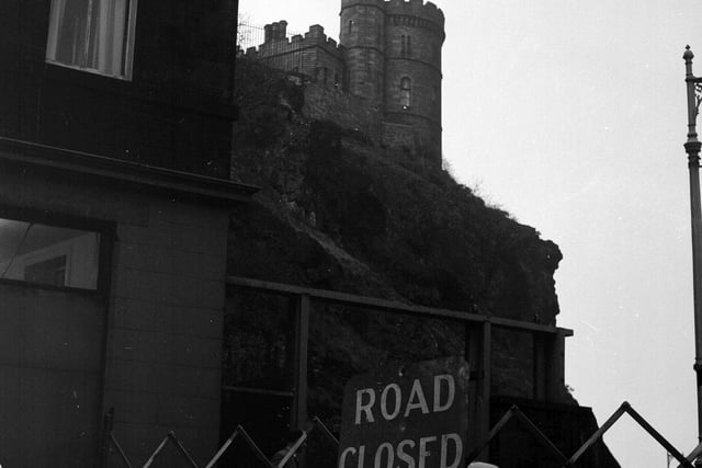 Calton Hill Road was closed due to loose rocks falling in April 1963.