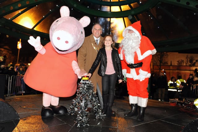 Provost Pat Reid, Peppa Pig and Grangemouth Children's Day Queen Georgia Forsyth join Santa to turn on the Christmaslights back in 2013