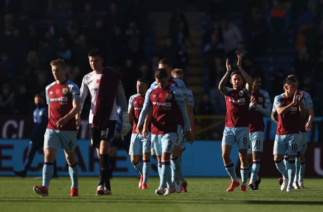 Josh Brownhill applauds fans as his side enters the field prior to the Premier League match between Burnley and Brentford at Turf Moor on October 30, 2021 (Photo by George Wood/Getty Images)