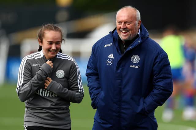 Neil Redfearn speaks with Sheffield United's Lucy Watson. (Photo by Jacques Feeney - The FA/The FA via Getty Images)