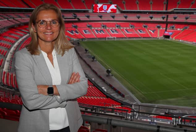 LONDON, ENGLAND - SEPTEMBER 09: Sarina Wiegman poses for a photo as she is unveiled As New Senior Head Coach Of The England Women's Team at Wembley Stadium on September 09, 2021 in London, England. (Photo by Catherine Ivill/Getty Images)
