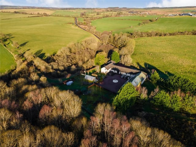 Aerial view of property showing countryside location.