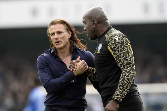 Rival Managers Owls Darren Moore with Wanderers Gareth Ainsworth     Pic Steve Ellis