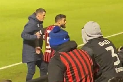 Ipswich Town captain had to be pulled away from a confrontation with a supporter after their draw at Bristol Rovers.