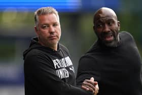 Sheffield Wednesday manager Darren Moore (right) and Peterborough United manager Darren Ferguson during the Sky Bet League One play-off semi-final second leg match at Hillsborough. Nick Potts/PA Wire.