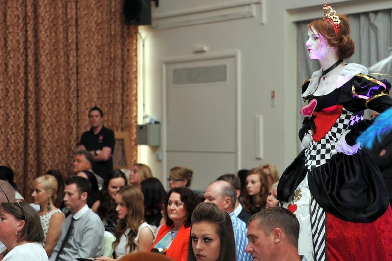English Martyrs Sixth Form College performing arts students performing as a living statue from Alice in Wonderland. Who remembers this 2012 event?