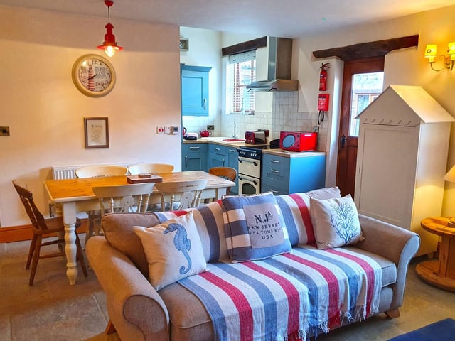 A lounge. The Lucasland Holiday Complex is a collection of 18th Century barns which have been restored and renovated into three self-contained cottages.