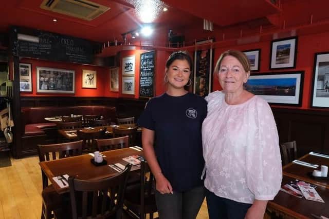 Ruby Harrison and owner Sue Crossland at Uncle Sam's