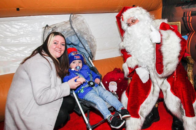 Logan (1) with mum Samantha at Santa's Grotto which visited Bo'ness town centre last weekend.
