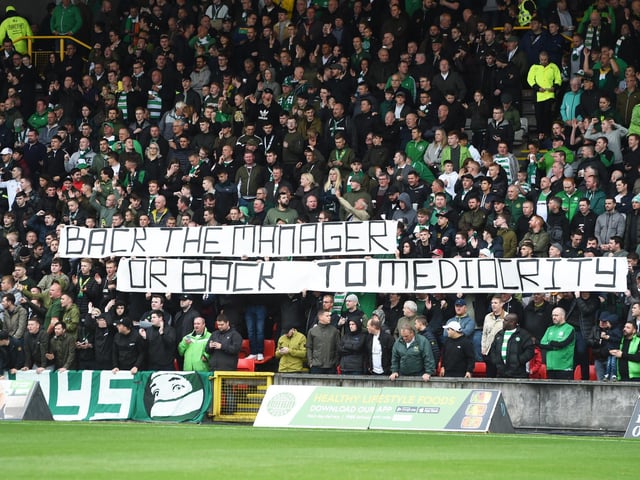 Celtic fans send a message to the board at a Betfred Cup clash against Partick Thistle in August 2018