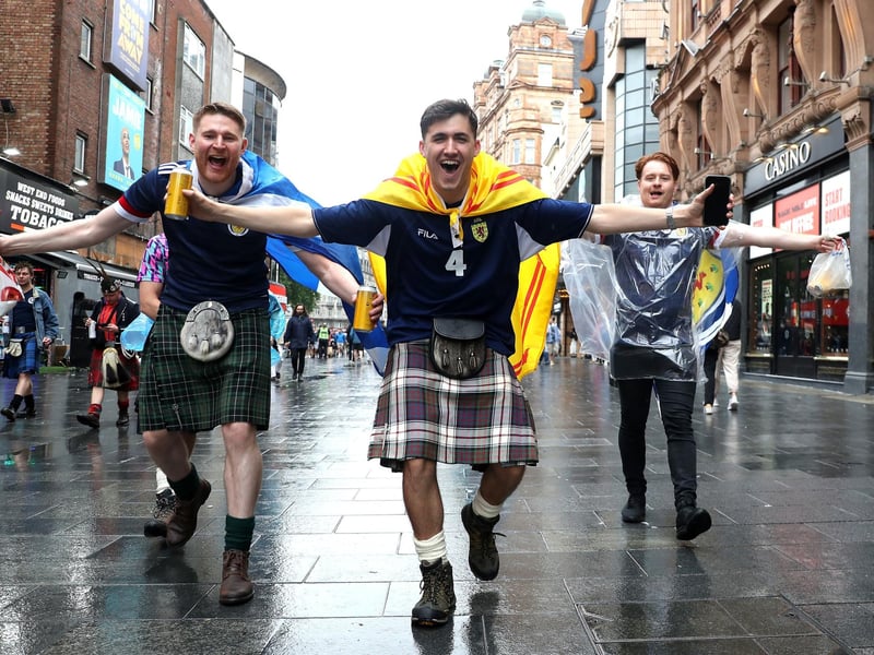 Proudly wearing their kilts on English ground, these fans show the camera they are all about supporting Scotland today (Kieran Cleeves/PA Wire).