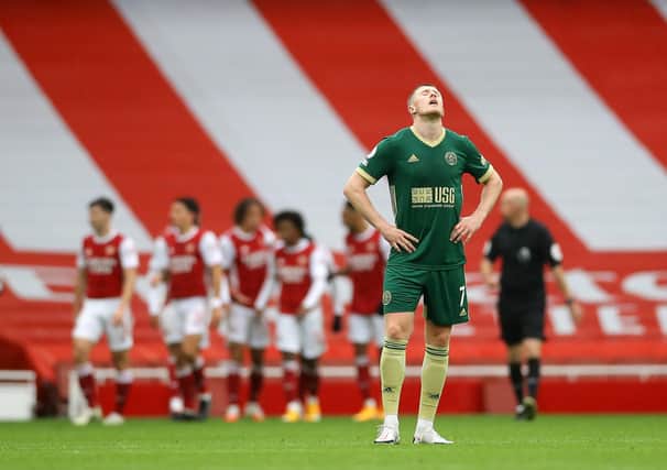 Sheffield United's John Lundstram looks on dejected after Arsenal's second goal: David Klein/Sportimage