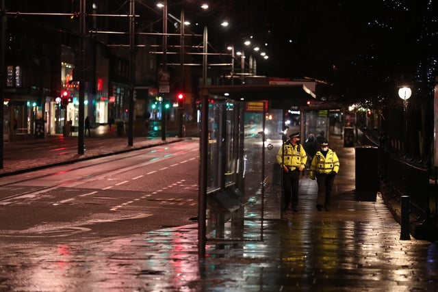 Police patrol a quiet Princes Street. Photo credit: Andrew Milligan
