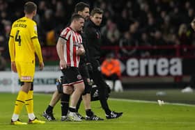 A frustrated John Fleck of Sheffield United leaves the pitch injured during his team's meeting with Rotherham at Bramall Lane: Andrew Yates / Sportimage