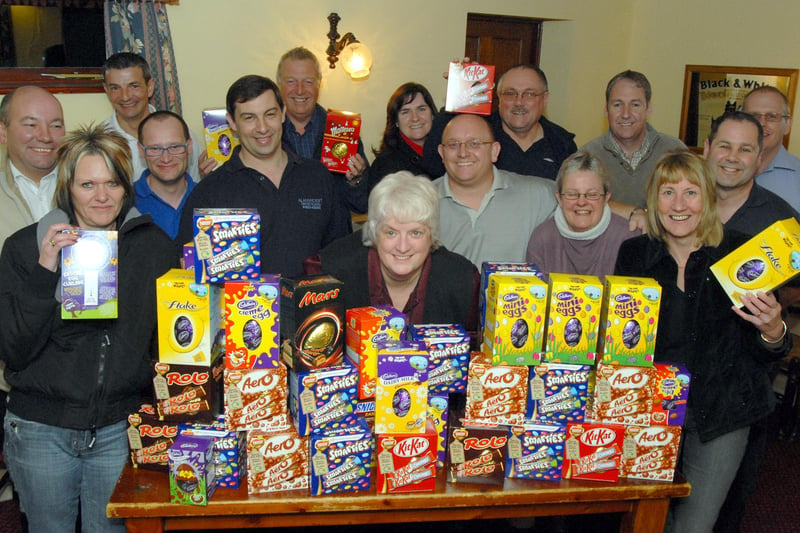 Bea Brunton, centre, receives Easter Eggs for PASIC from members of the Mansfield and Ashfield Driving Instructors' Association at a presentation at the Rifle Volunteer in Skegby.