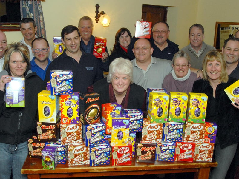 Bea Brunton, centre, receives Easter Eggs for PASIC from members of the Mansfield and Ashfield Driving Instructors' Association at a presentation at the Rifle Volunteer in Skegby.