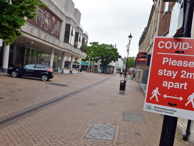 Mansfield Town centre 10 weeks into lockdown. Signs going up in preparation for more lockdown easing on Monday June 15th.
