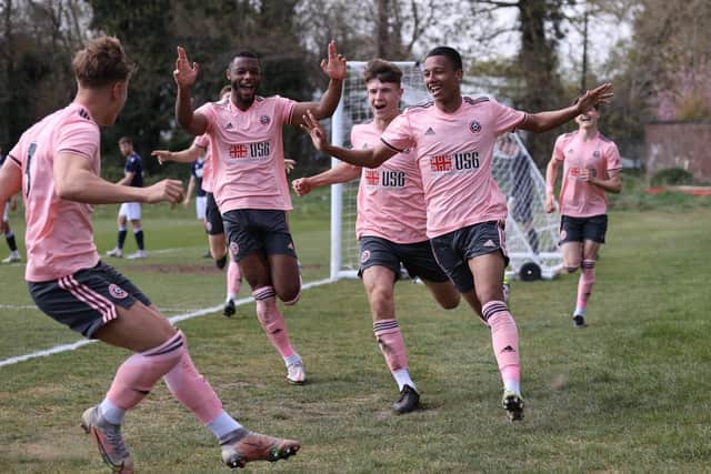 Sheffield United celebrate Kyron Gordon's winner which sealed the league title at MIllwall (Pic: Sportimage)