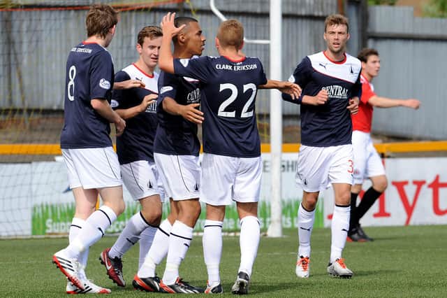Phil Roberts celebrating scoring for Falkirk against Clyde in the Scottish League Cup in August 2013 (Pic: Lisa McPhillips)
