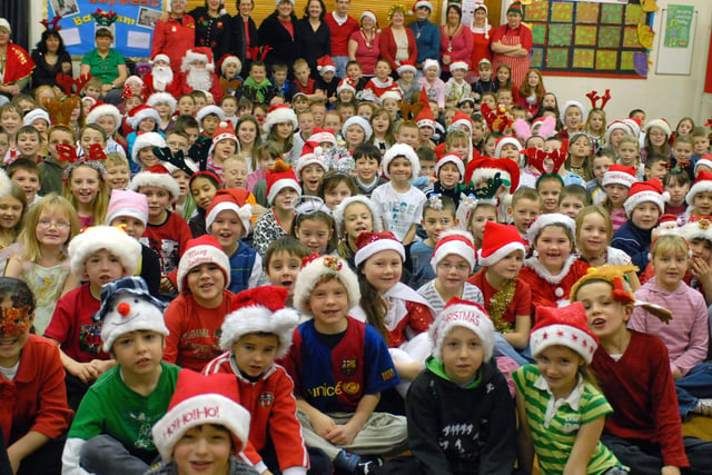 Pupils dressed as Santa's helpers for a fundraising event in 2007. Can you spot someone you know?