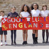 Pupils from Malin bridge Primary School show their support for England in Euro 2020. Connor Hanson, Maggie Pulleng, Sasha Lewin,Robyn Lewin, Gracie Walsh and Anisah Khan.  Picture Scott Merrylees